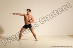 Underwear Fighting Man White Muscular Short Brown Dynamic poses Academic